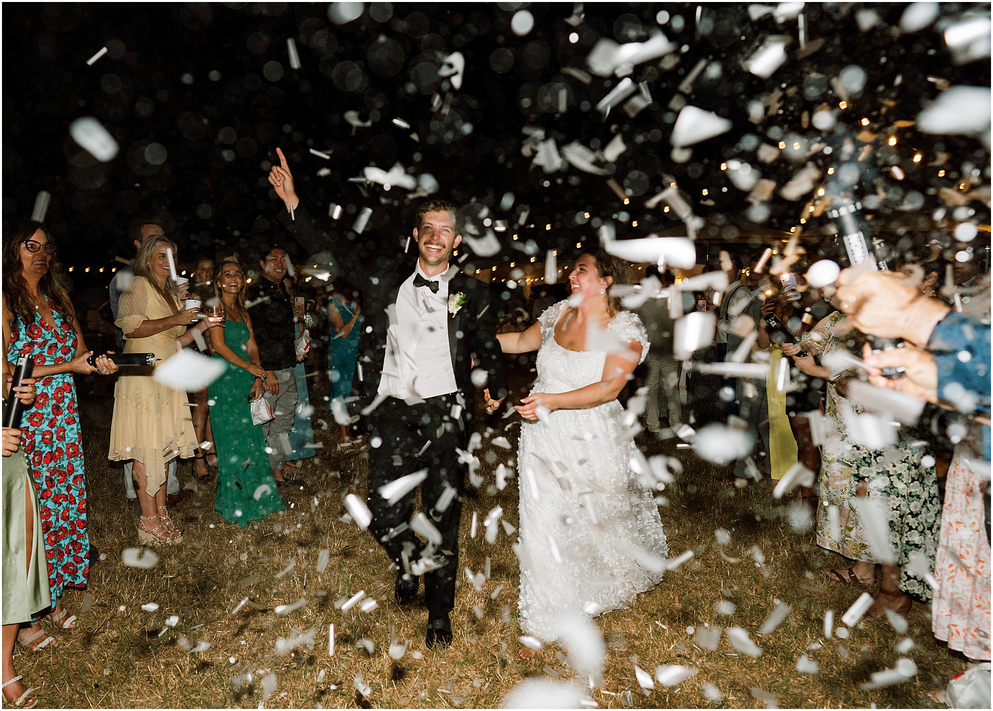 Bride and groom confetti exit