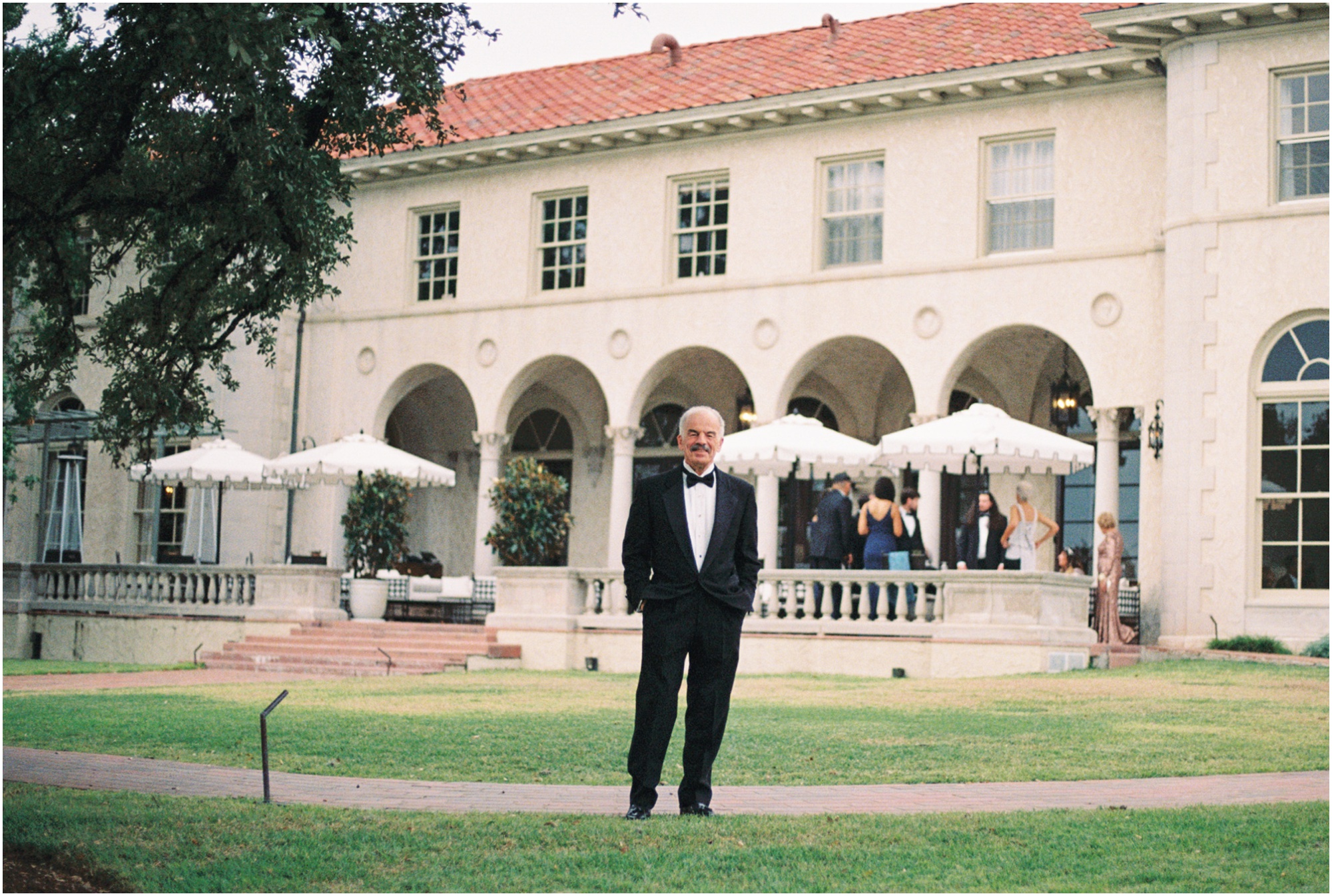 candid moments of grandparents at a wedding at commodore perry estate in austin texas