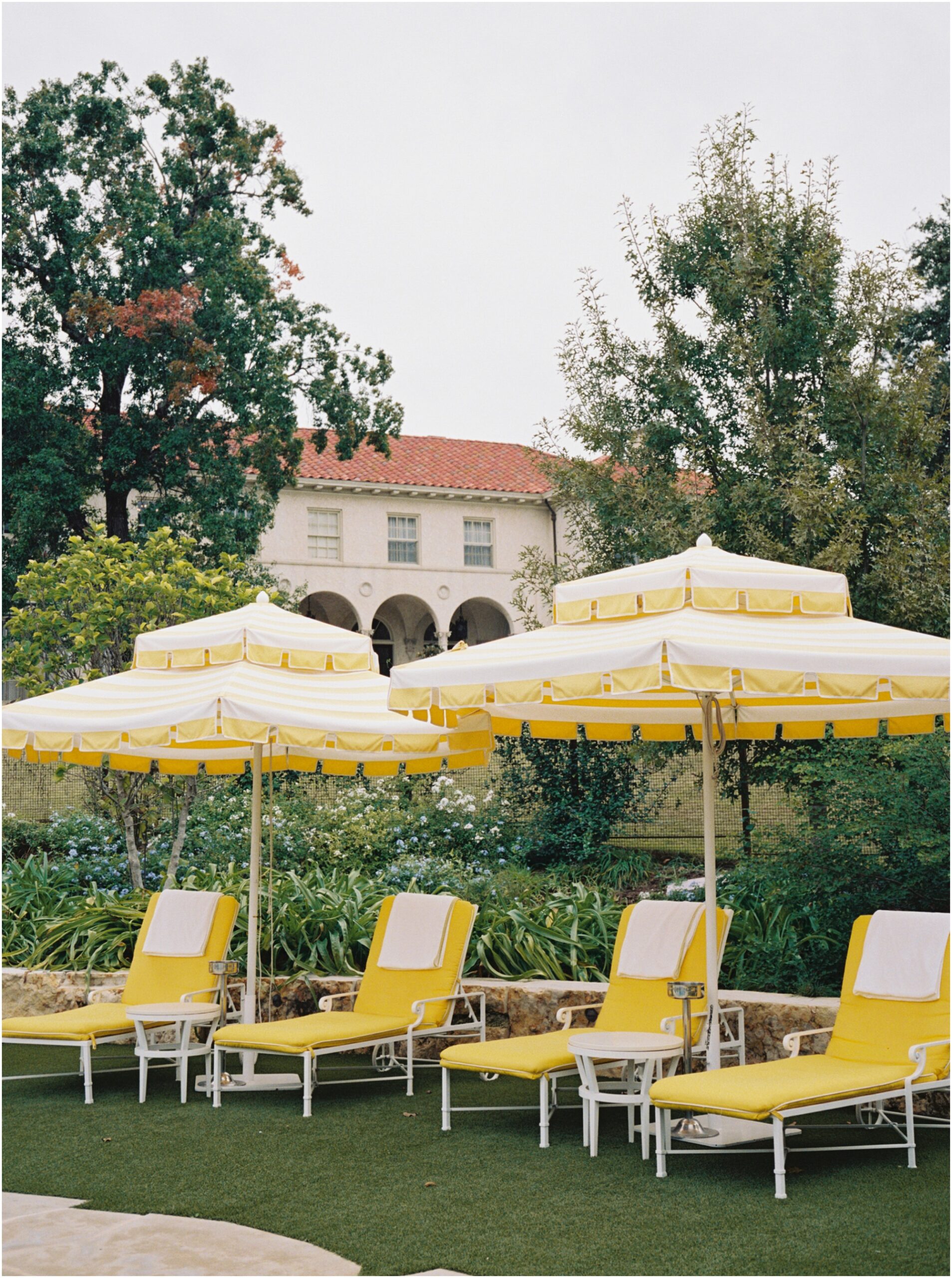 commodore perry estate in Austin, Texas wedding on 120mm film with yellow umbrellas