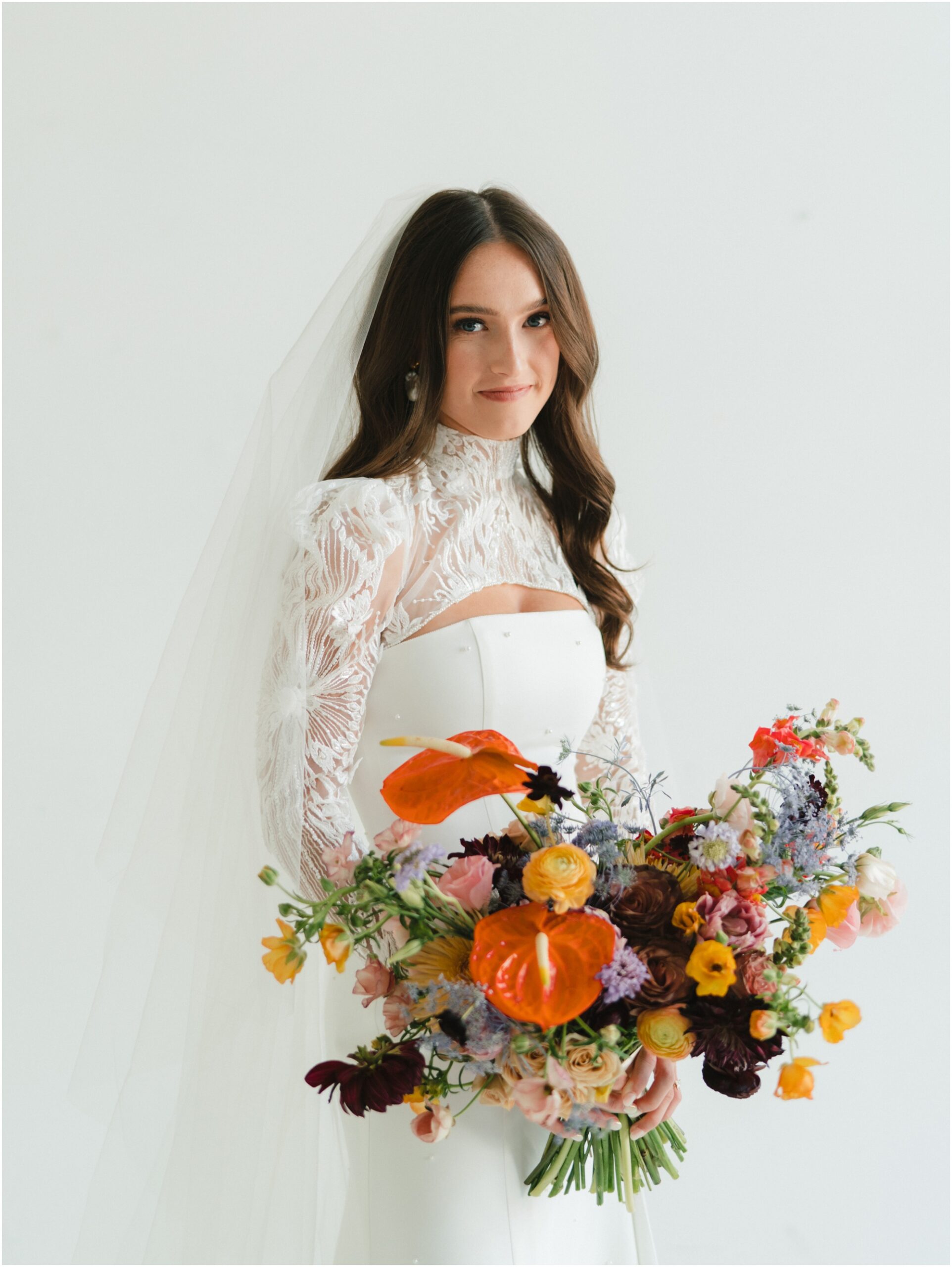 bridals in the studio with colorful bouquet