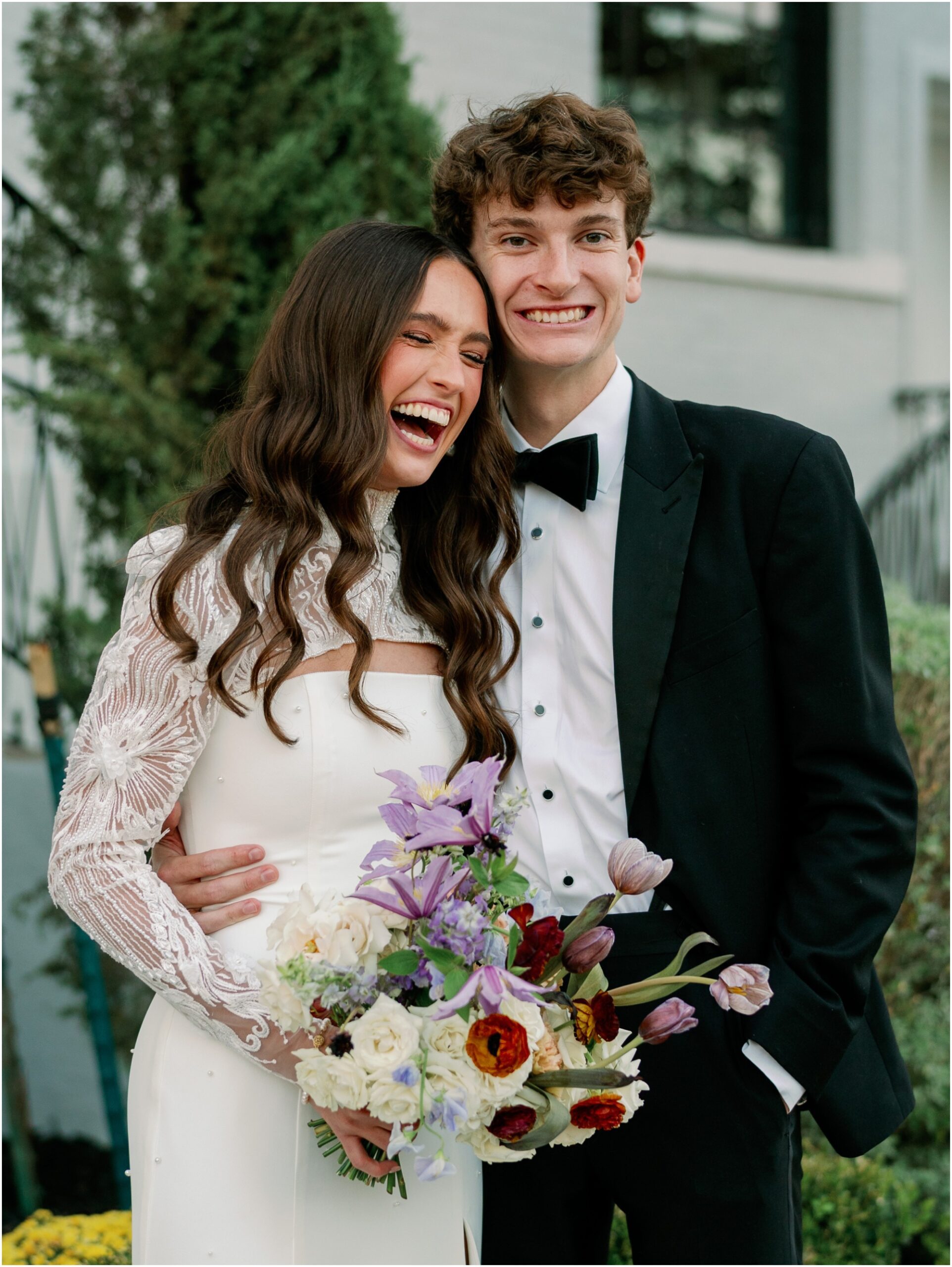 bride and groom portraits with laughing